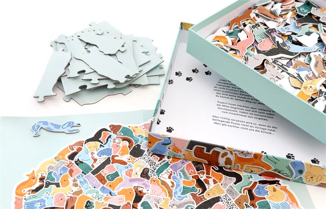 Puzzle "299 Hunde und 1 Katze"
