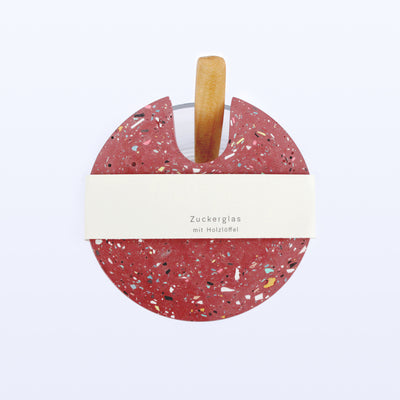 Zuckerglas mit Löffel Rot