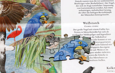 Puzzle "In 50 Vögeln um die Welt"